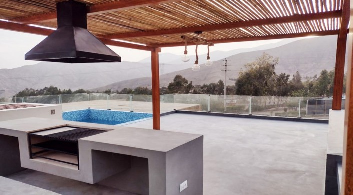 ZONA DE PARRILLA Y PISCINA